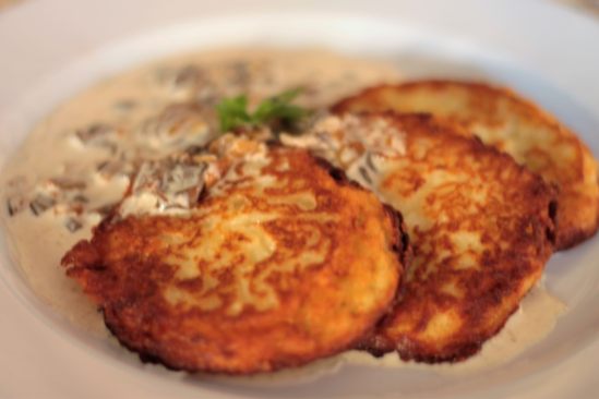 Potato pancakes with mushroom sauce